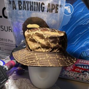 A BATHING APE COLLEGE MONOGRAM REVERSIBLE TO BLACK BUCKET HAT